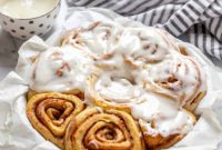 Spiced Carrot Cake Cinnamon Rolls with Cream Cheese Frosting