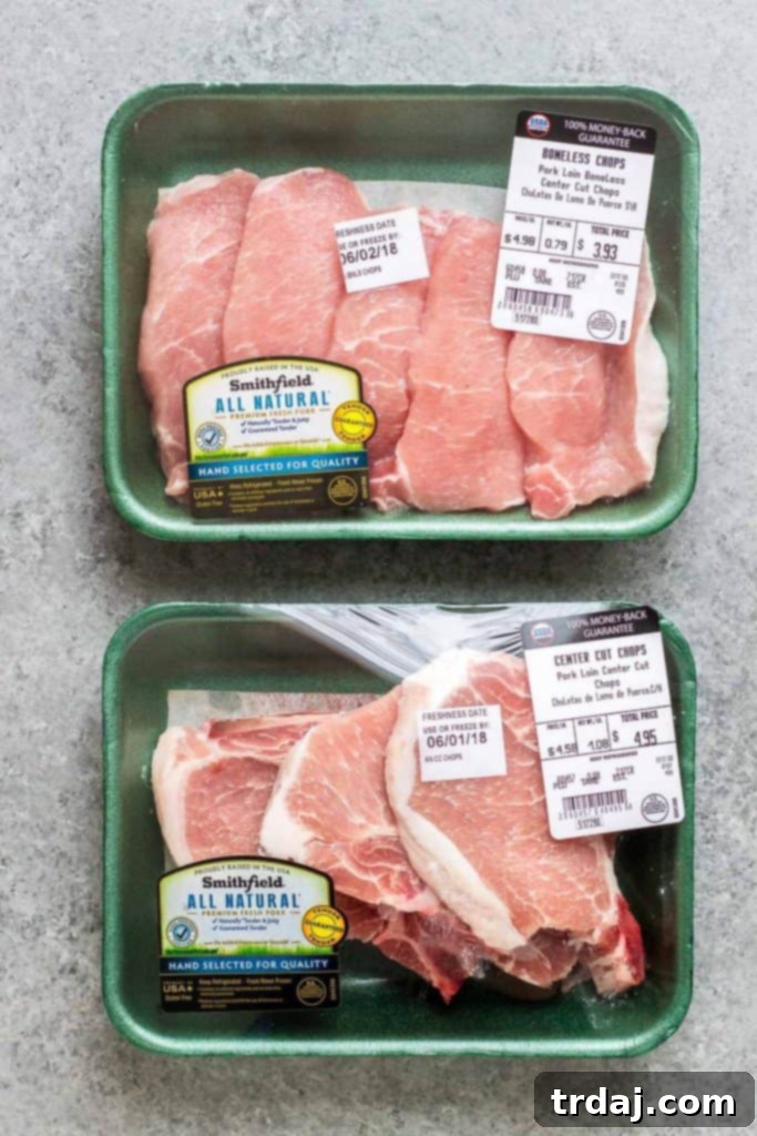 Pan-seared Peach and Dijon Pork Chops plated beautifully with shallots and thyme.