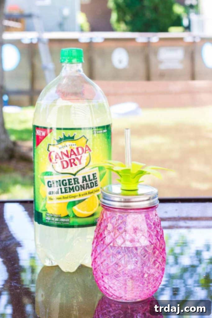 Stylish pink pineapple glass for sipping Canada Dry Ginger Ale and Lemonade in your backyard