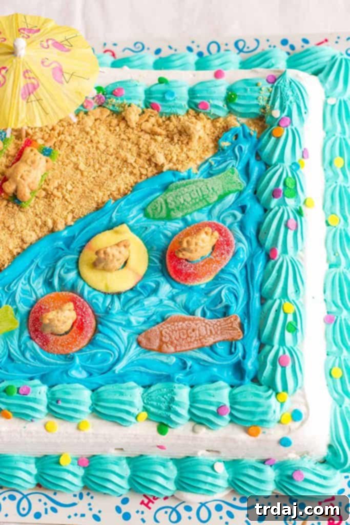 Delicious Easy Summer Beach Cake with candy decorations and teddy bears on a blue background, perfect for a pool party
