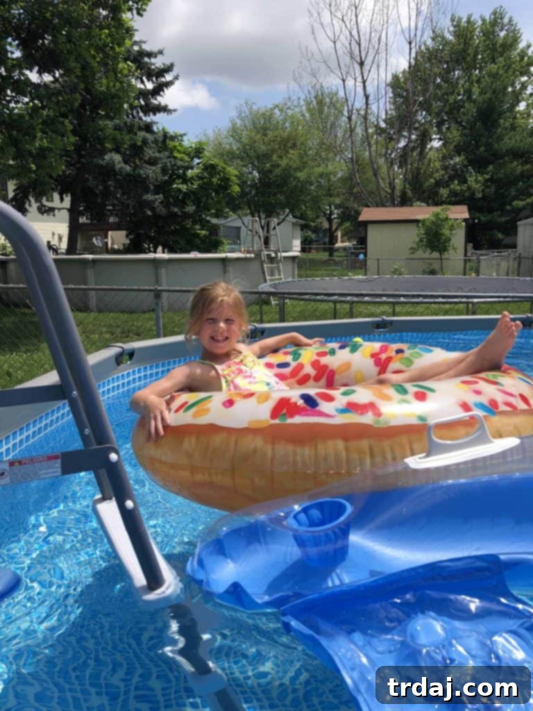 A top-down shot of the Easy Summer Beach Cake, showing all its decorative elements, surrounded by a vibrant, fun atmosphere.