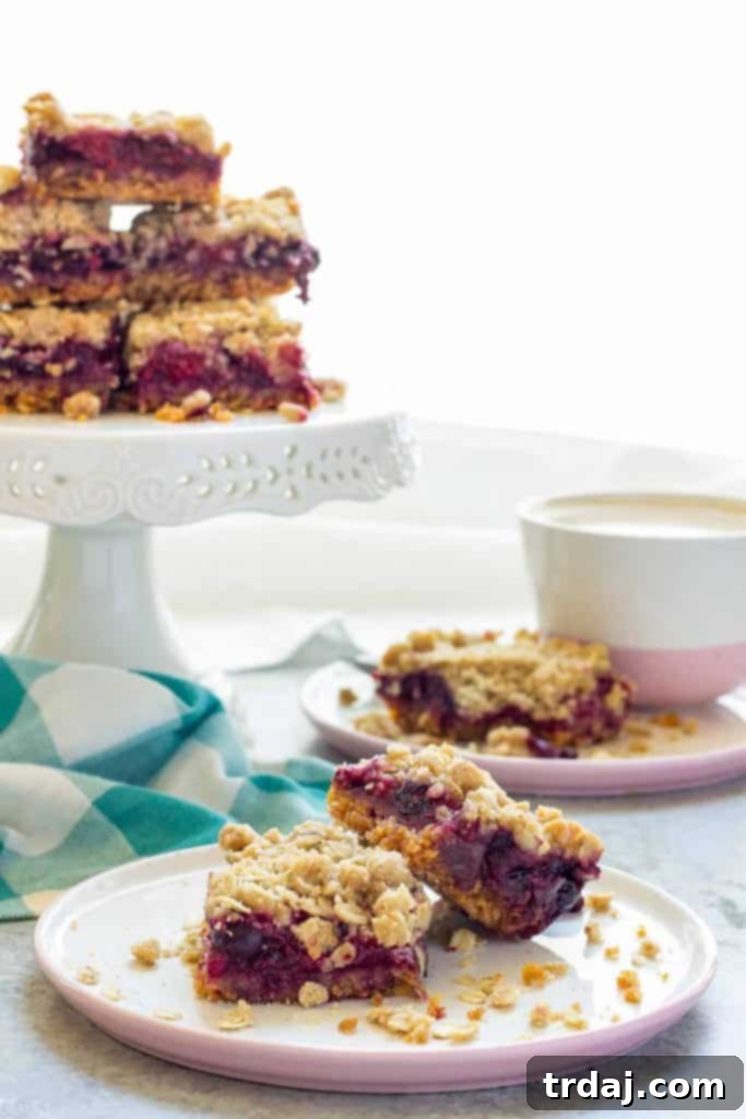 Delicious homemade Mixed Berry Crumble Bars, a perfect breakfast or snack with fresh berries.