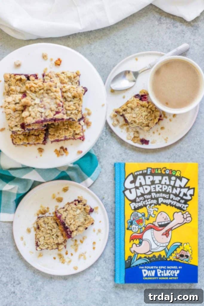 Happy children proudly displaying their new Scholastic books acquired through the Kellogg's promotion.