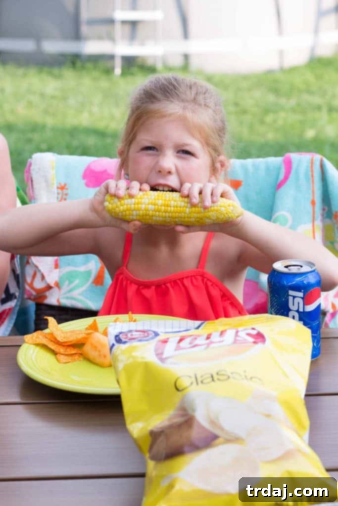 Family enjoying a summer BBQ with Jewel-Osco products