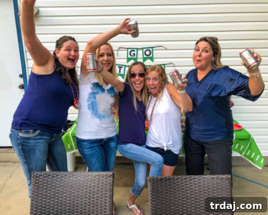 Friends showing off their team spirit in jerseys and accessories at a lively homegate party.