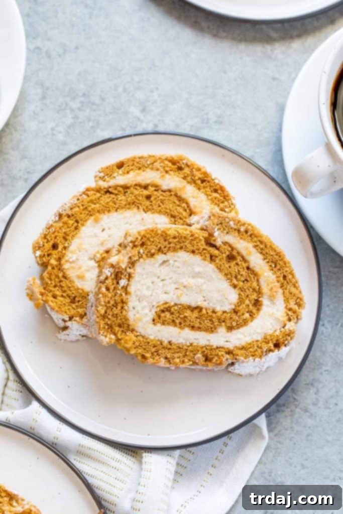 Master the art of making a flawless Pumpkin Cake Roll with Cookie Butter Filling. Our detailed guide makes rolling, filling, and serving this show-stopping dessert easier than ever!