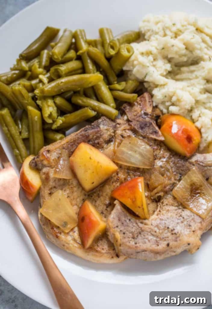 I have found my new obsession in Swiss Diamond. The blue color is gorgeous, it’s large enough to fit 4 bone in pork chops and it heats beautifully. AND lucky for you Swiss Diamond is giving away a 10 piece Kitchen Kit, which includes their new pans, so don’t forget to enter the giveaway down below. Back to these One Pan Pork Chops with Apples and Cinnamon. They’re super simple to make and were a huge hit with the family. My kids love apples and pork so it was an easy win for me. I paired them with green beans and some mashed potatoes to round out the meal. Well actually they aren’t mashed potatoes, they’re a veggie mash made with cauliflower. These One Pan Pork Chops with Apples and Cinnamon come together in under 30 minutes and are perfect for a Fall night! One Pan Pork Chops with Apples and Cinnamon