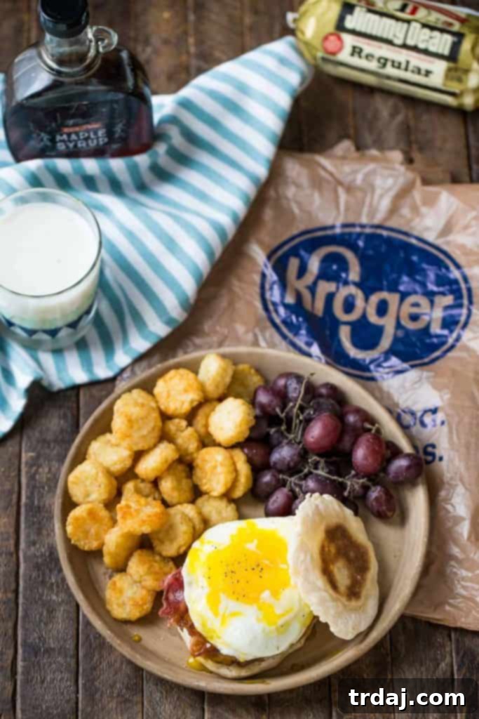 Close-up of Jimmy Dean sausage patties cooking on a grill pan for The Ultimate Breakfast Burger