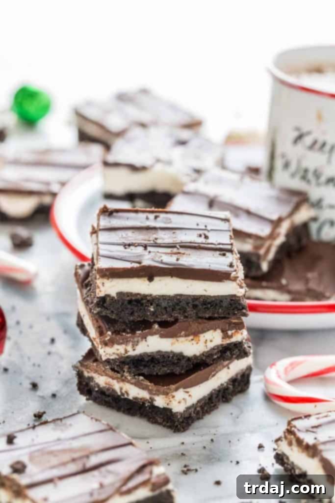 Rich and decadent layers of cookies, creamy peppermint filling and semisweet chocolate make these Peppermint Patty Bars a mint lovers dream! Peppermint Patty Bars