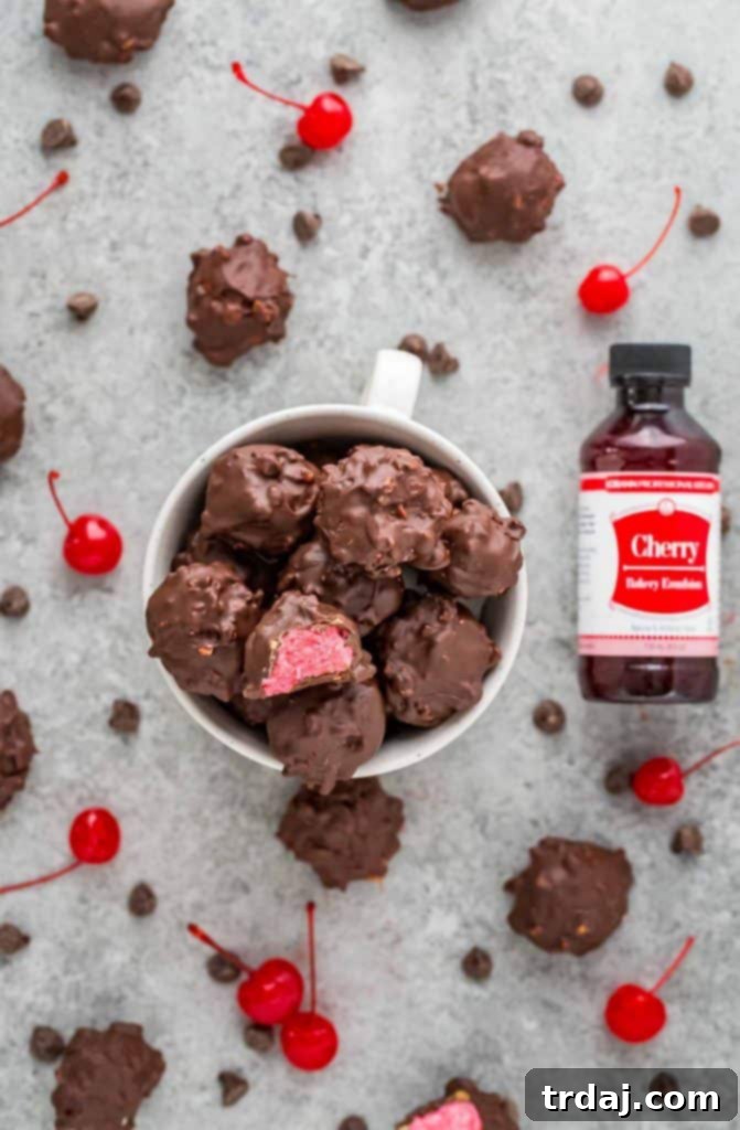 Cherry Mash Truffles featuring a bottle of LorAnn Oils Cherry Bakery Emulsion, highlighting a key ingredient