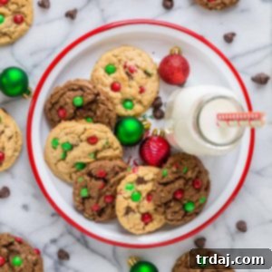 Two types of Christmas Monster Cookies on a festive platter