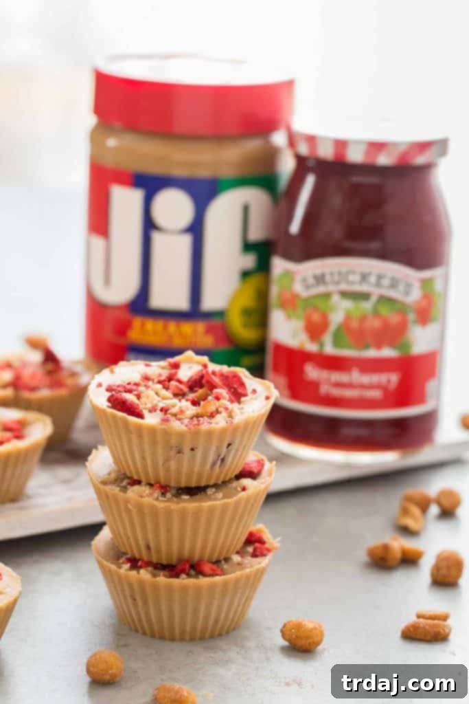 Peanut Butter and Jelly Cups topped with crushed peanuts