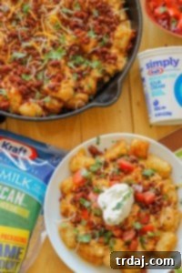 Queso Fundido Totchos: a savory and cheesy appetizer with tater tots, perfect for any gathering.