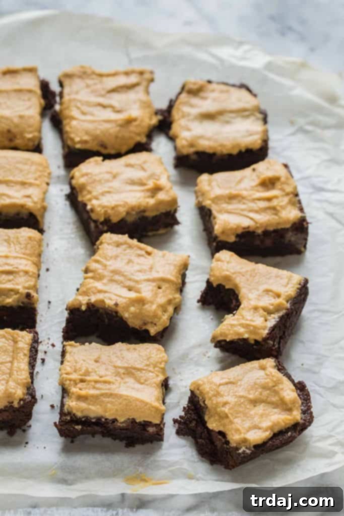 These Hazelnut Espresso Brownies are chewy, fudgy and packed with rich coffee flavor to bring out an intense chocolate experience only highlighted by the hazelnut buttercream frosting! Hazelnut Espresso Brownies topped with creamy hazelnut buttercream