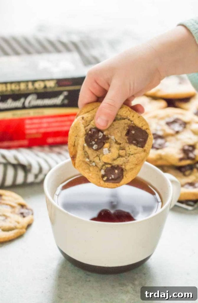 Stack of Tahini Toffee Chocolate Chip Cookies with visible chocolate and toffee bits