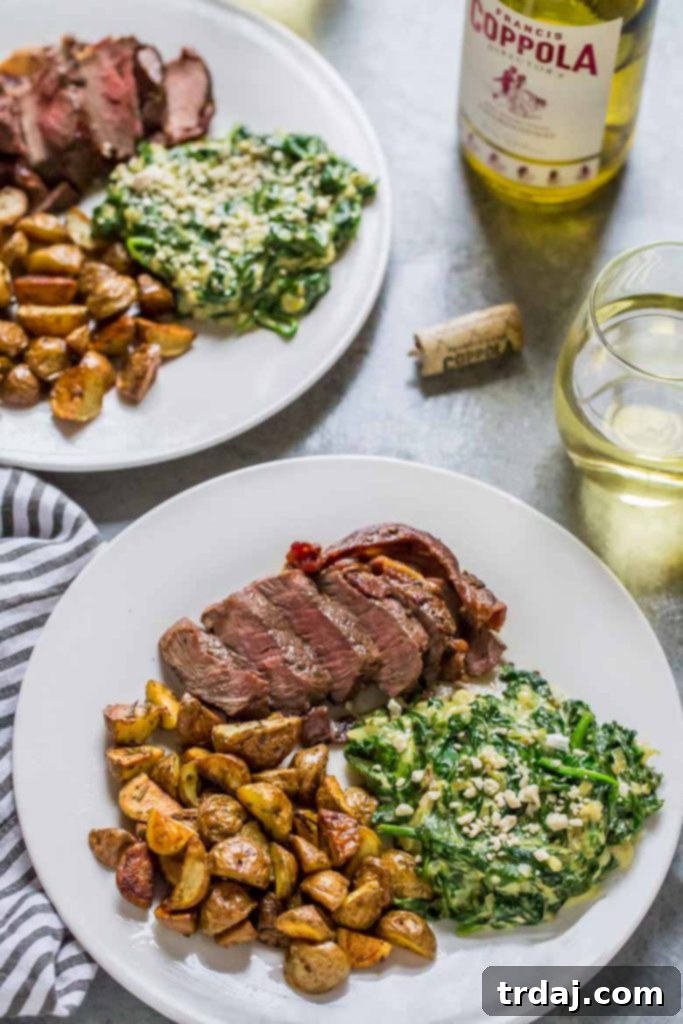 Close-up of a perfectly seared filet mignon, part of a luxurious Steakhouse Dinner for Two