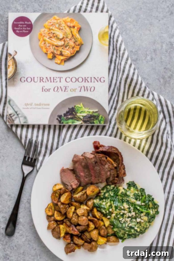 The 'Gourmet Cooking for One or Two' cookbook by April Anderson, showcasing elegant small-batch recipes