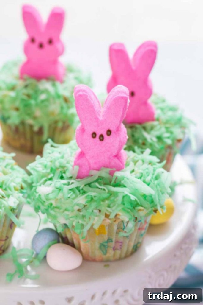 Finished Marshmallow Bunny Cupcakes with green coconut and pink PEEPS