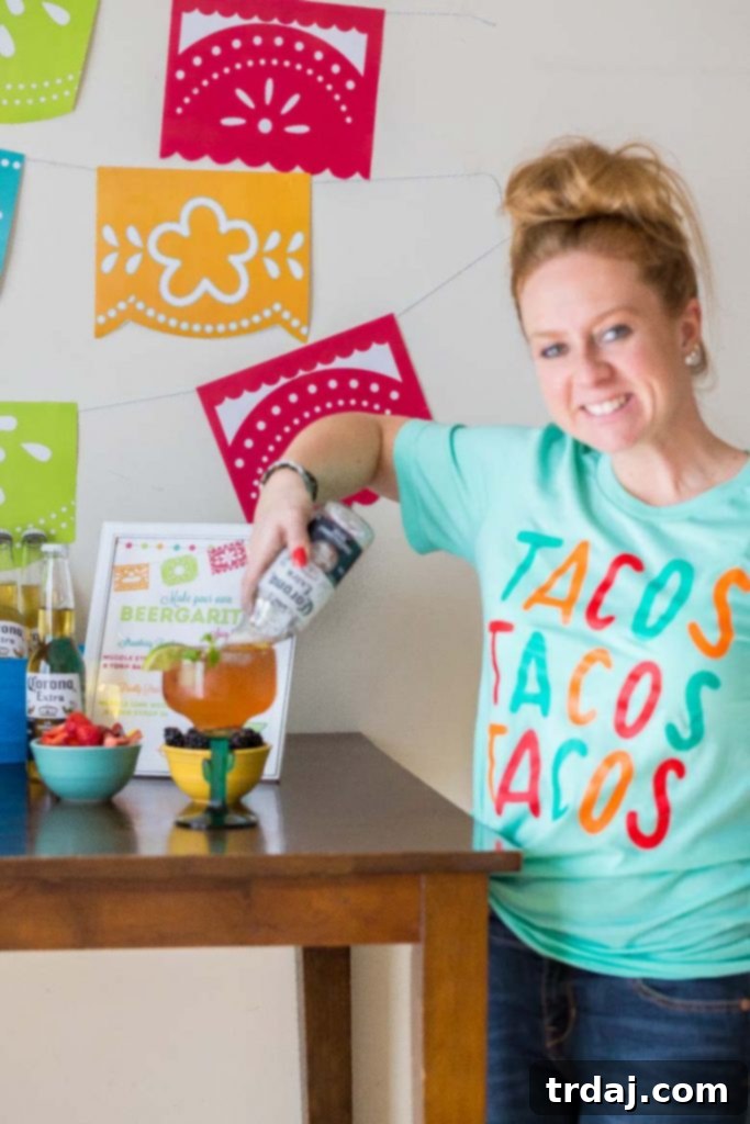 Woman wearing a festive Cinco de Mayo themed shirt at a party