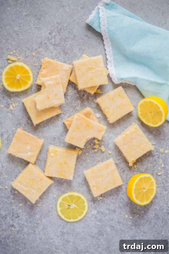 These Lemon Shortbread Bars are buttery and bursting with bright and fresh lemon flavors! Lemon Shortbread Bars with fresh lemons