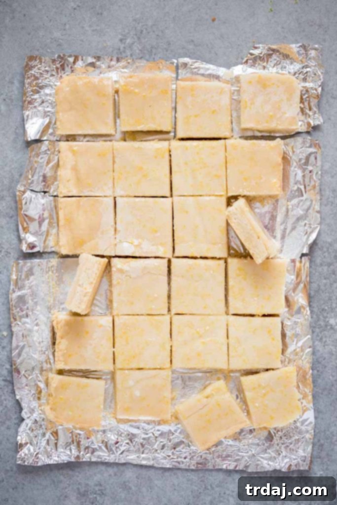 These Lemon Shortbread Bars are buttery and bursting with bright and fresh lemon flavors! Freshly glazed Lemon Shortbread Bars