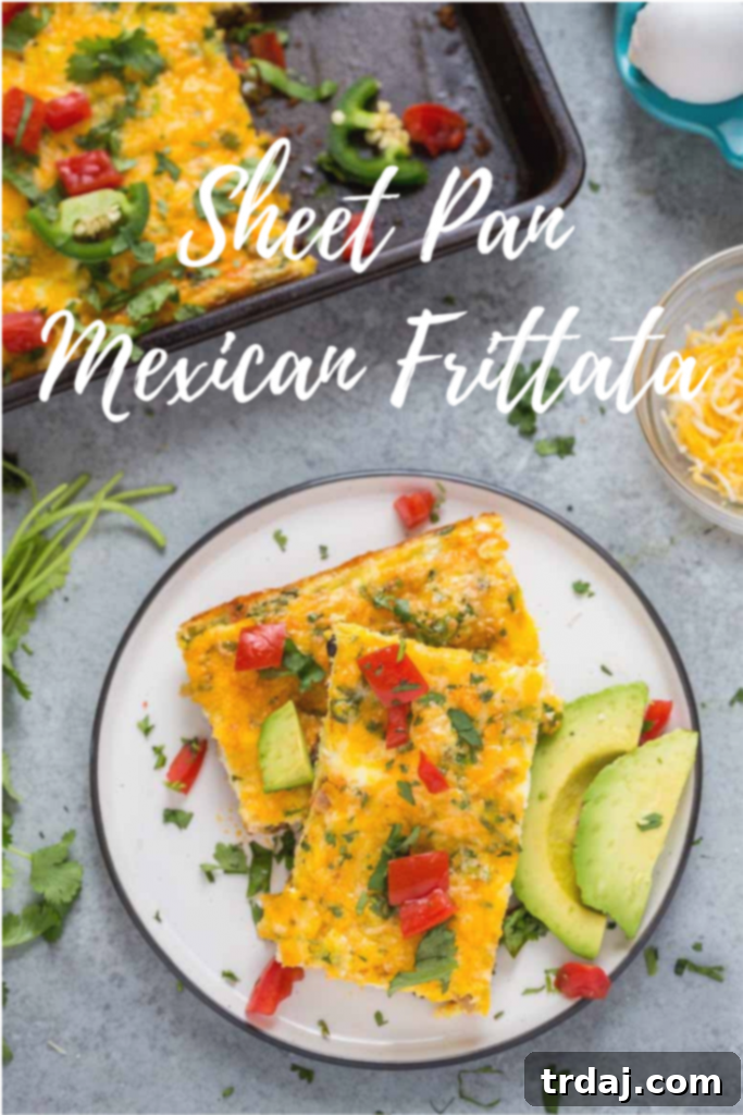 This Sheet Pan Mexican Frittata is packed full of delicious Mexican flavors and is perfect for a crowd or meal prep! Finished Sheet Pan Mexican Frittata sliced into servings, ready for breakfast or brunch