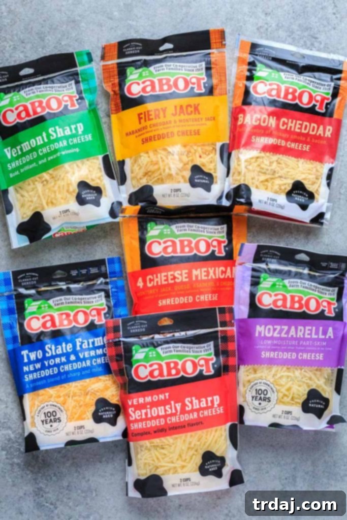 This Sheet Pan Mexican Frittata is packed full of delicious Mexican flavors and is perfect for a crowd or meal prep! Cabot 4 Cheese Mexican Blend packaging next to a block of bacon cheddar cheese, highlighting the quality