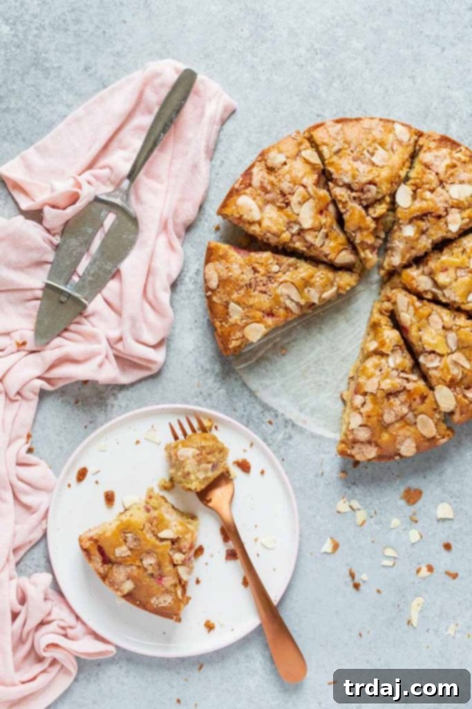 Strawberry Rhubarb Coffee Cake with crunchy almond topping