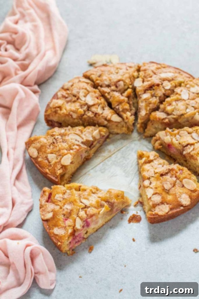 A whole Strawberry Rhubarb Coffee Cake ready to be served