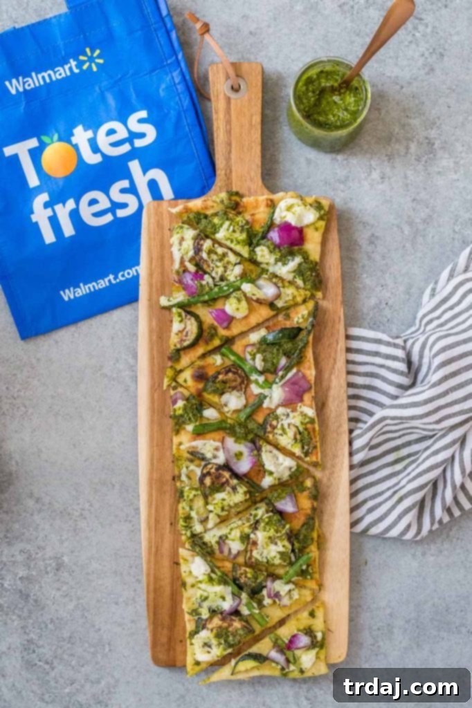 Enjoying Grilled Vegetable Flatbreads outdoors with friends, a perfect summer meal.