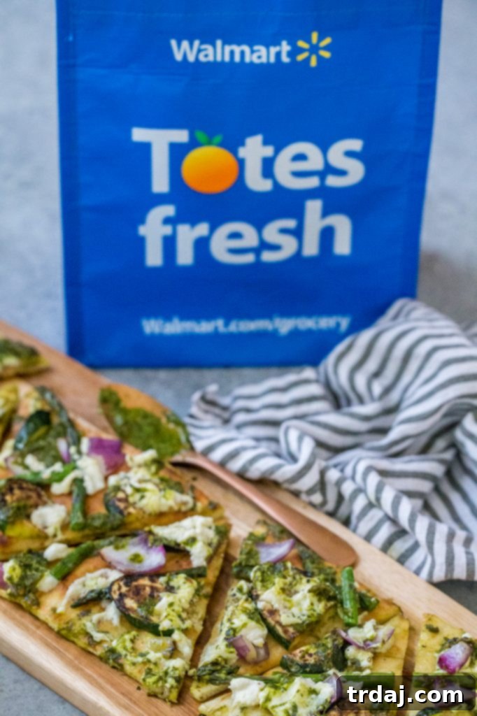 Fresh ingredients laid out for making Grilled Vegetable Flatbreads and vibrant Salsa Verde.
