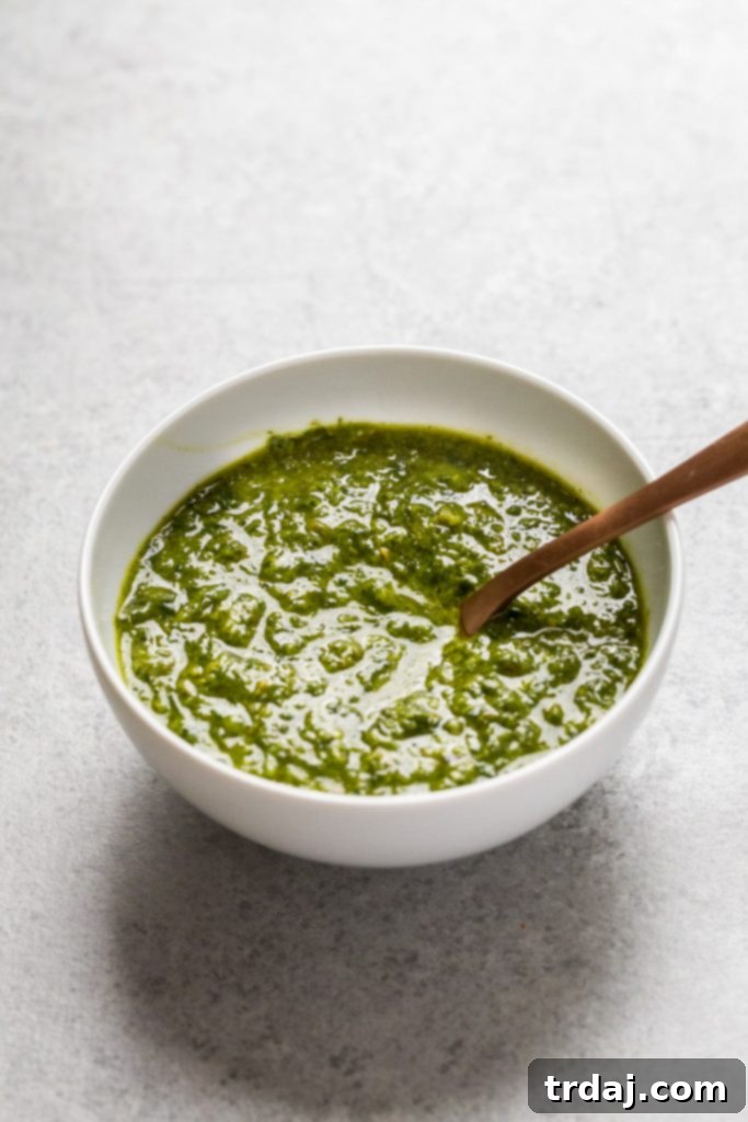 Finished batch of homemade salsa verde, a versatile and flavorful sauce.