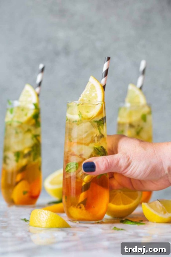 Peach Basil Mojito Mocktail - close up of fresh, bubbly drink
