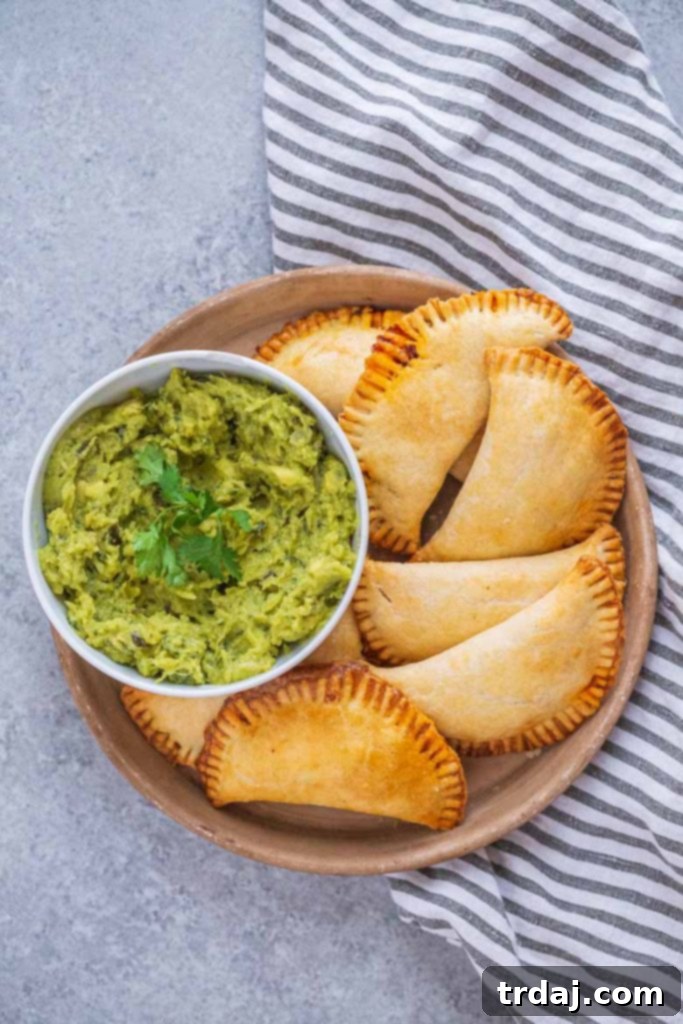 Plate full of baked beef empanadas