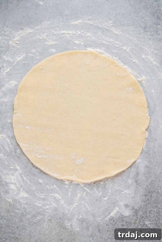 Roll our pie crust for baked beef empanadas