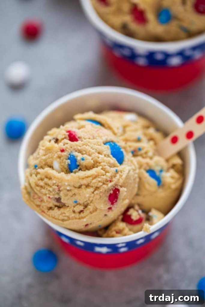 Patriotic Edible Cookie Dough, a spoonful of delicious, egg-free dessert, perfect for celebrating holidays and special moments.