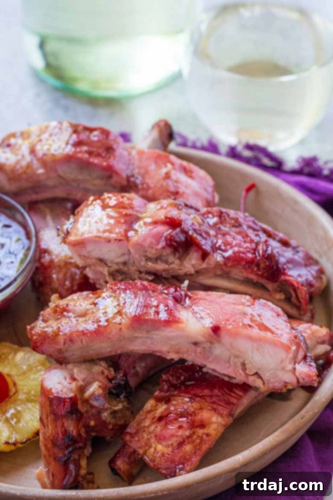 Indulge in these Cherry Pineapple Glazed Ribs, a delightful 4-ingredient dinner for your outdoor BBQ. Cherry Pineapple Glazed Ribs