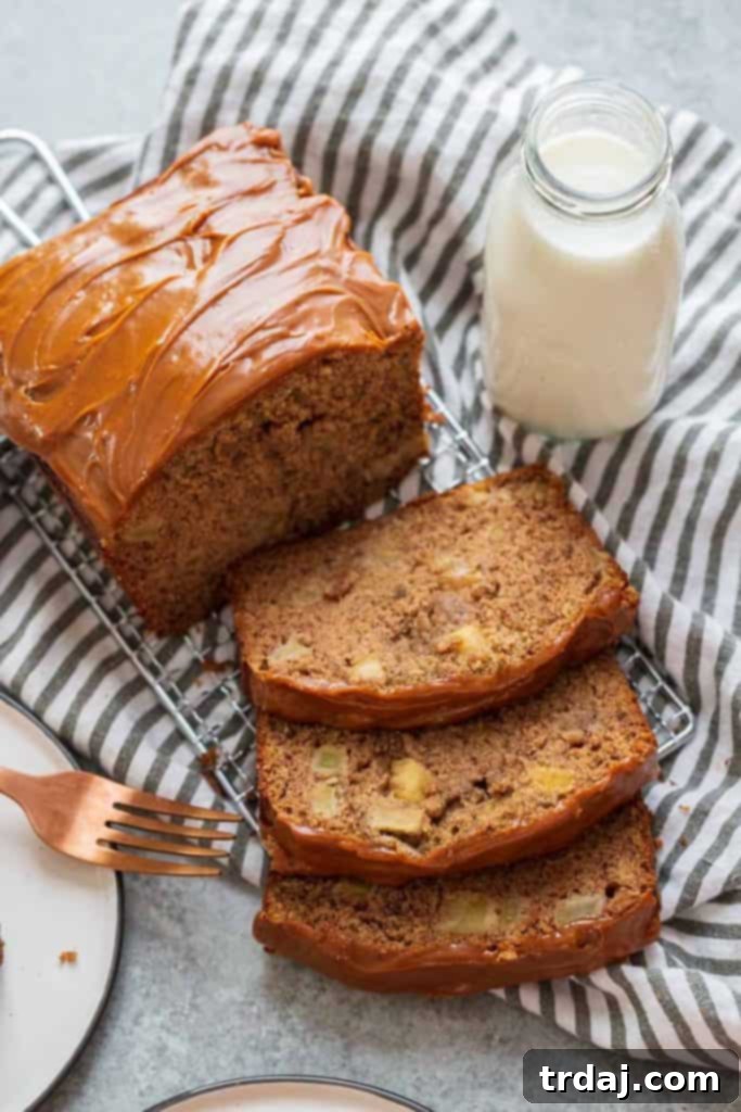 Delicious Caramel Apple Cider Banana Bread sliced and ready to serve.