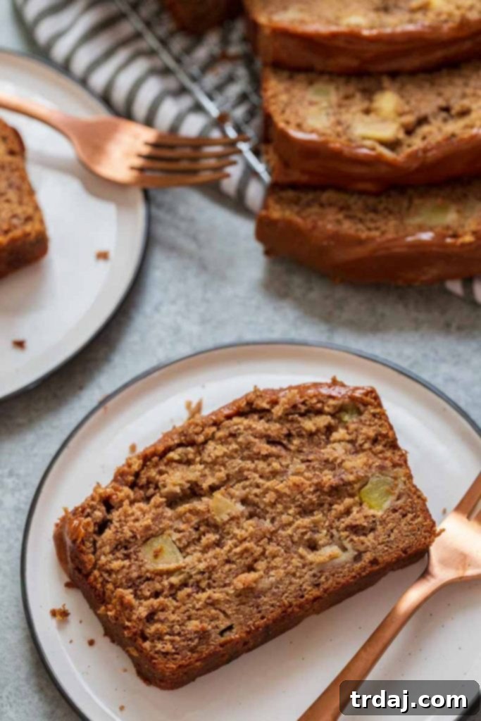 Close-up of baked Caramel Apple Cider Banana Bread, golden brown and tempting.