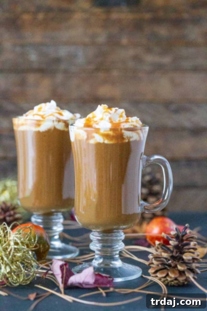 Homemade Butterscotch Pumpkin Spice Latte topped with whipped cream and pumpkin spice sauce