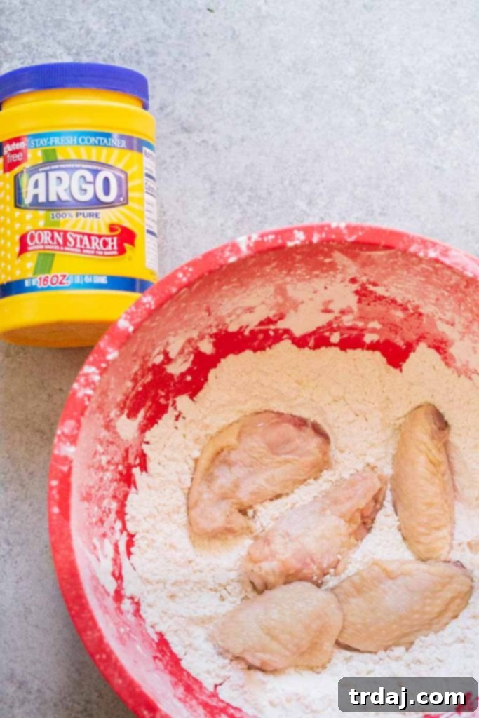 Chicken wings coated in corn starch and spices ready for baking