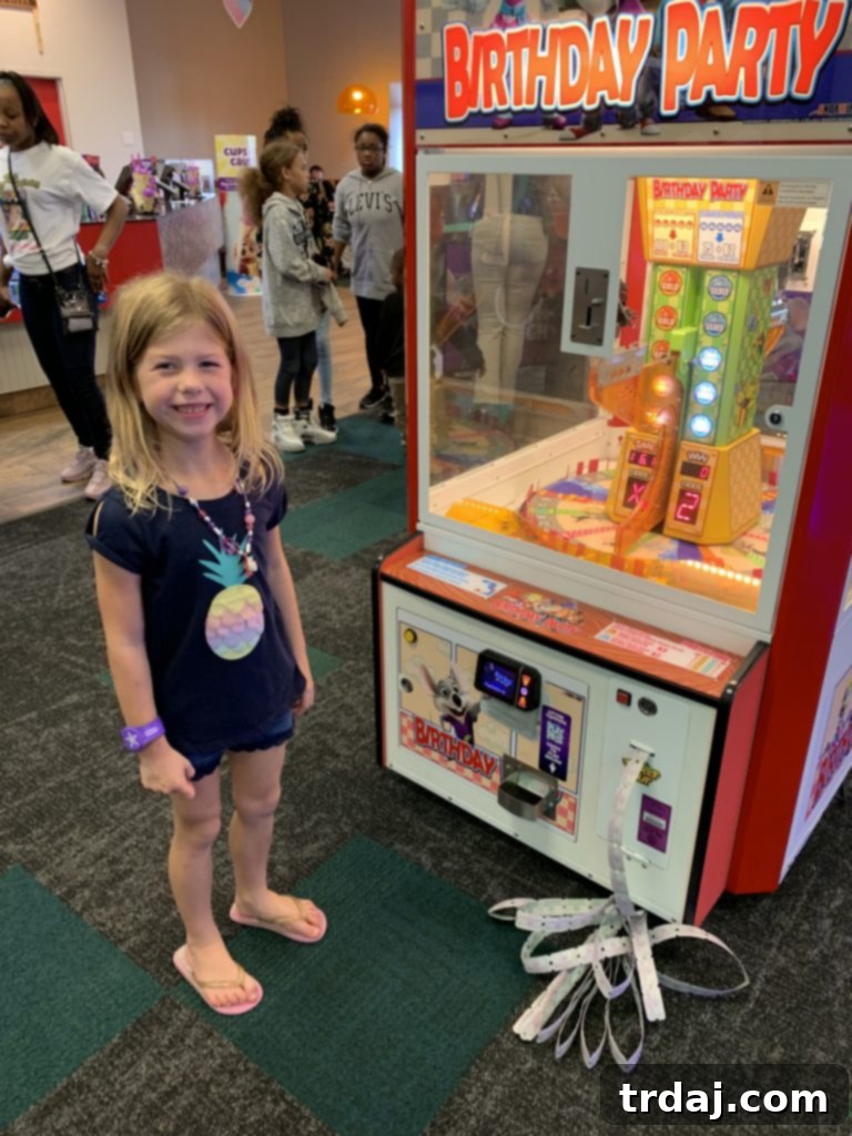 Happy family enjoying the lively atmosphere at Chuck E. Cheese
