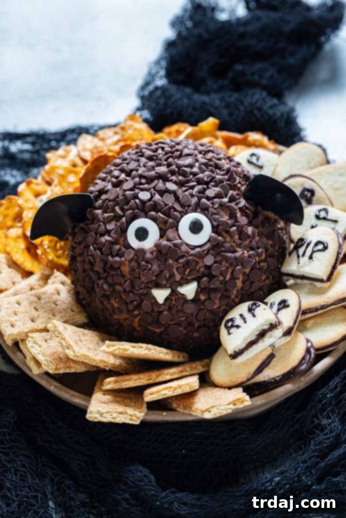 Death by Chocolate Dessert Cheese Ball Death by Chocolate Dessert Ball is a chocolate lover's dream, filled with rich chocolate sauce and rolled in mini chocolate chips, making it the perfect festive party dessert.