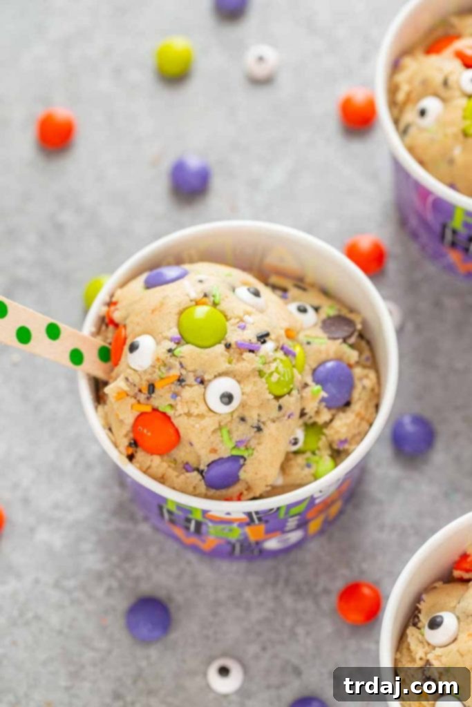 Monster Mash Halloween Edible Cookie Dough is egg free, packed with festive Halloween sprinkles and a spooky delicious way to enjoy dessert!