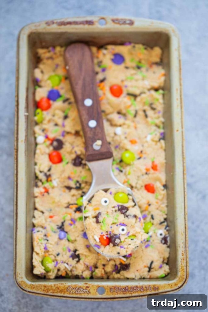Monster Mash Halloween Edible Cookie Dough is egg free, packed with festive Halloween sprinkles and a spooky delicious way to enjoy dessert!