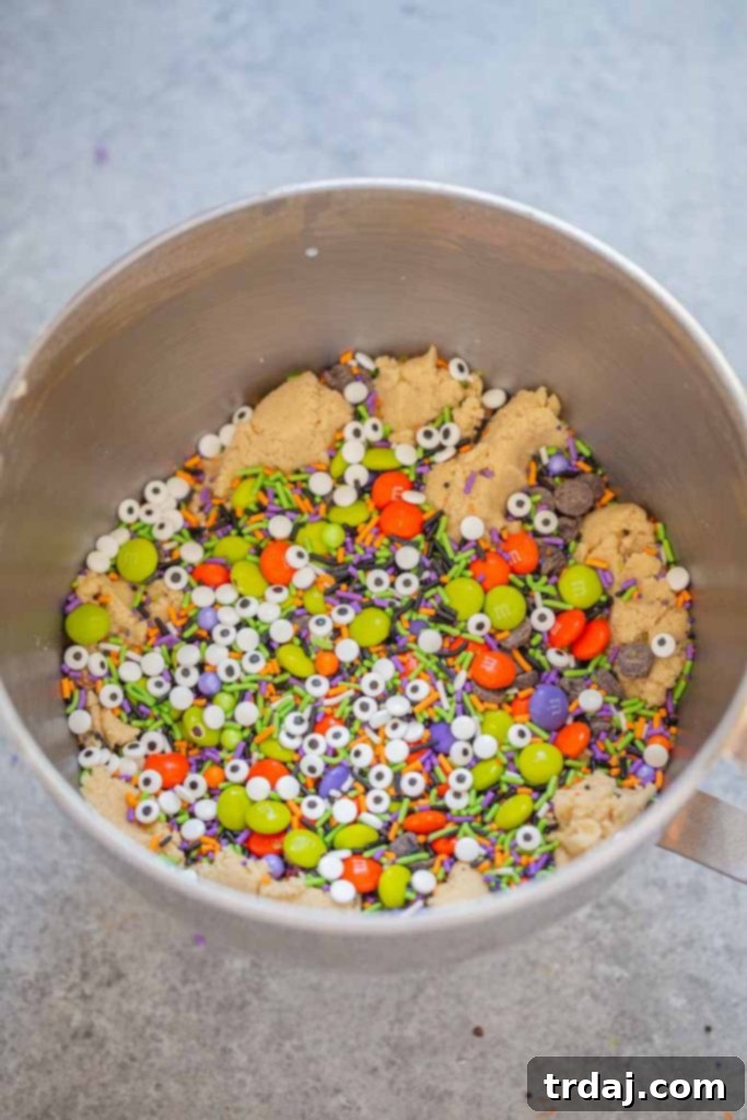 Bowl of edible cookie dough with M&M's, sprinkles and candy eyeballs