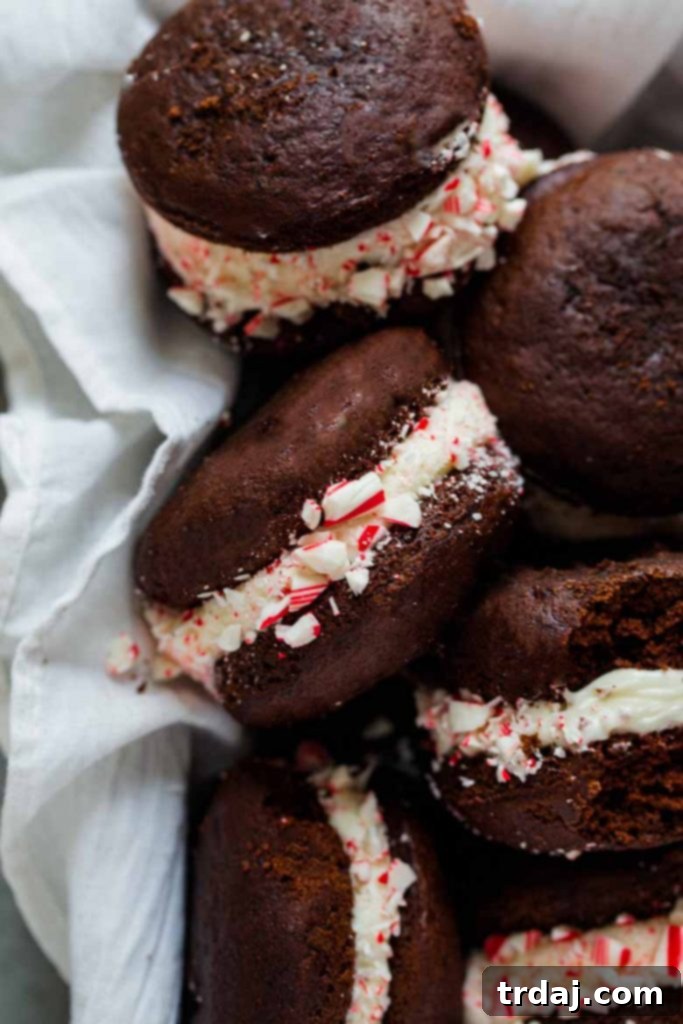 Candy Cane Whoopie Pies stacked for a festive display A beautifully arranged stack of Candy Cane Whoopie Pies, ready to be served