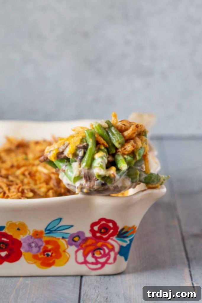 A vibrant and delicious homemade Green Bean Casserole from Scratch, perfectly baked and ready to be served as a delightful side dish.
