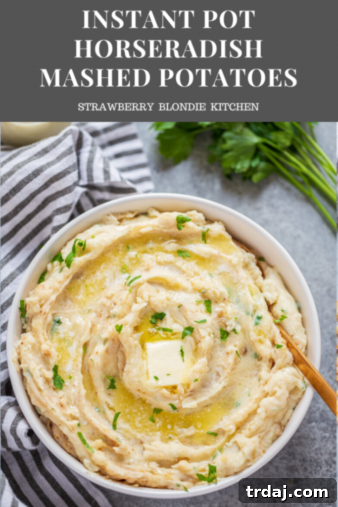 Full bowl of creamy Instant Pot Horseradish Mashed Potatoes, generously garnished with fresh herbs, ready to be served.