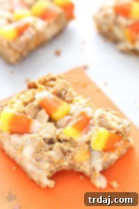 Enchanting Candy Corn Magic Bars 2 A delicious Candy Corn Magic Bar with a seven-layer profile.